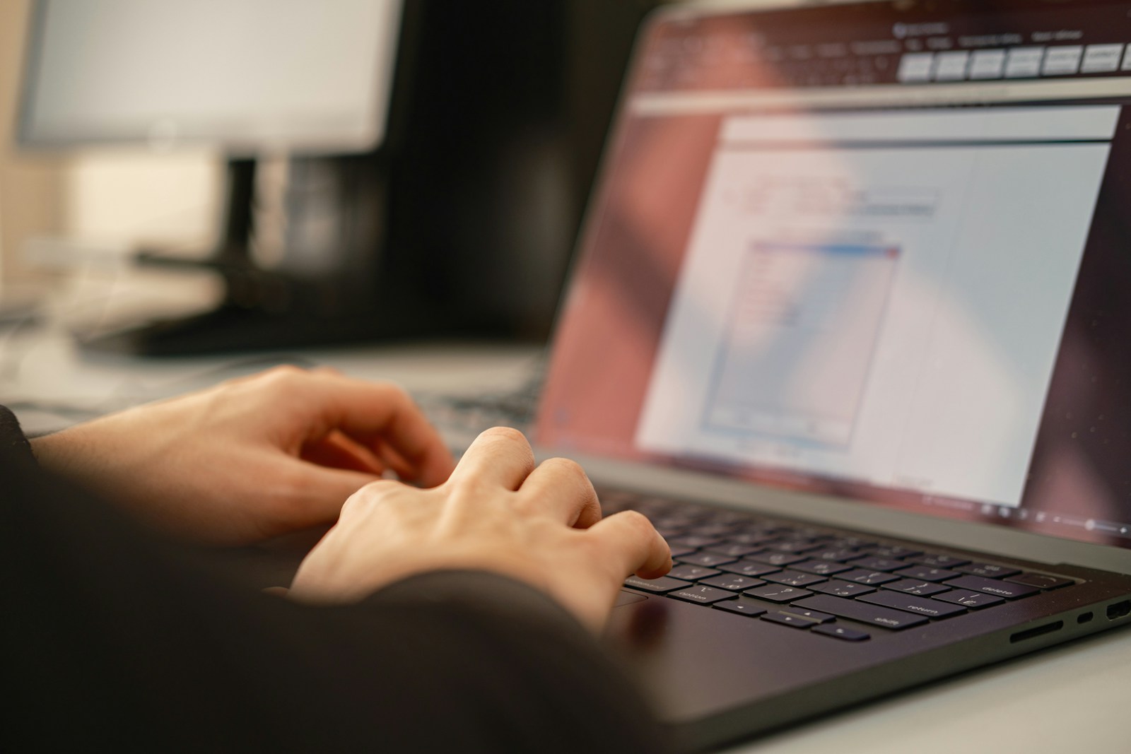 A developer working on a laptop